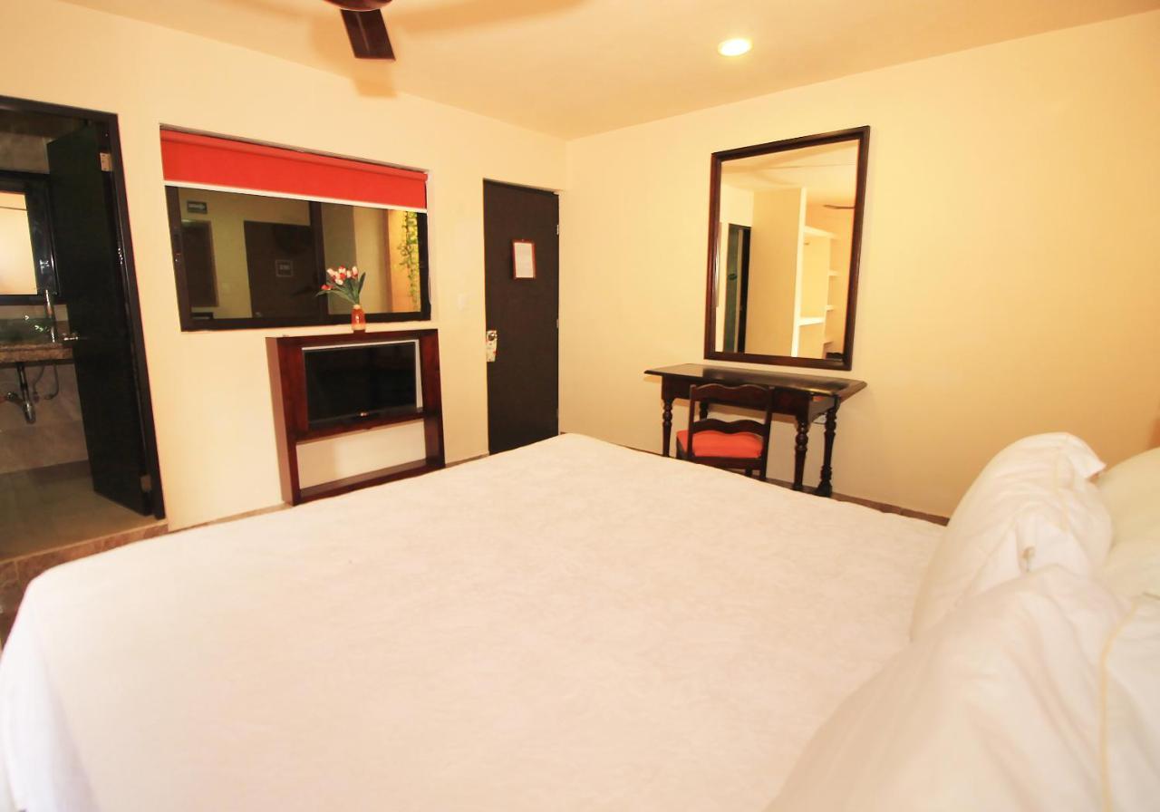 Papagayo Hotel Boutique Плайя-дель-Кармен Екстер'єр фото A room at the hotel