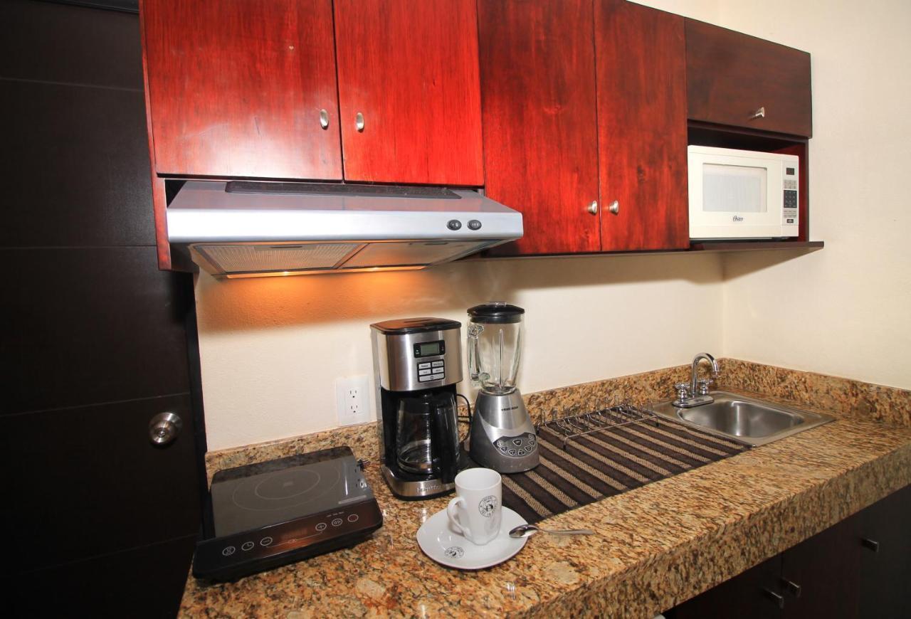 Papagayo Hotel Boutique Плайя-дель-Кармен Екстер'єр фото A coffeemaker in a kitchen